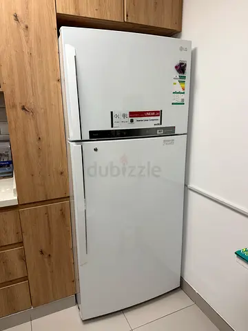 LG white top-freezer refrigerator - good condition