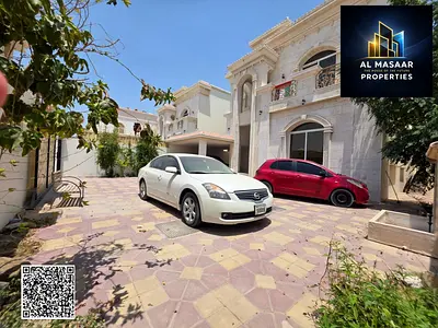 Luxury villa with stone facade and super deluxe finishes for sale in Al Muwaihat 1, Ajman – strategic location and large land area! A unique property