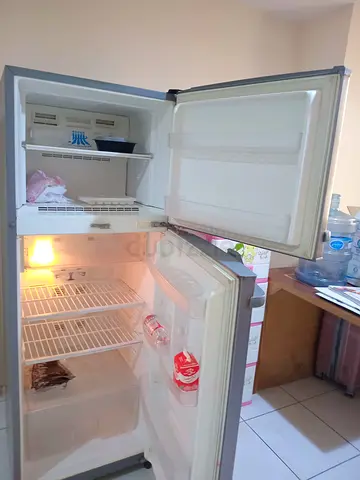 Silver double-door Dawoo refrigerator - good working condition, 350 AED