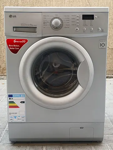 LG direct drive 6kg washing machine, condition working good, silver color.
