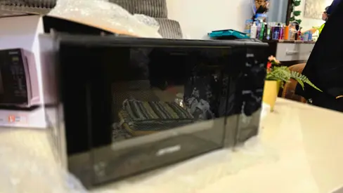 Microwave Black Countertop Aftron - Good Condition Slightly Used