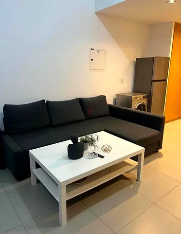 Dark grey L-shaped sofa with chaise - good condition