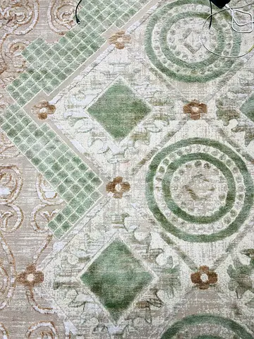 Light green and beige patterned area rug - good condition carpet