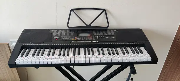Portable electronic keyboard with stand