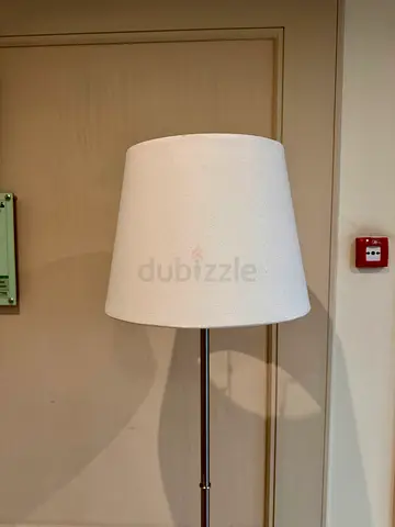 Simple white floor lamp with fabric shade