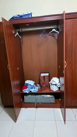 Wooden wardrobe / armoire in good used condition — 4-door with hanging rail and shelf