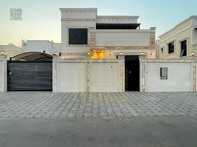 Villa for sale in Ajman, Al Zahia area. 4 master bedrooms, living room, majlis, and maid's room. Fr