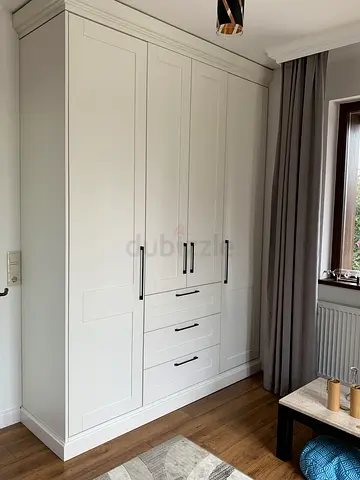 Modern White Wardrobe with Four Doors and Three Drawers