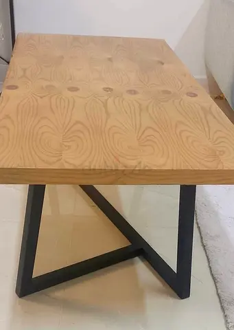 Solid wood coffee table with black metal legs - light oak finish