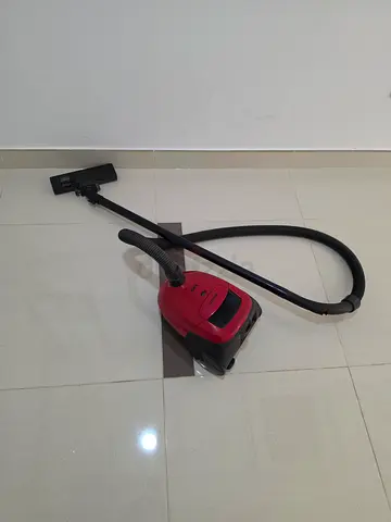 Red canister vacuum cleaner - working condition