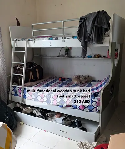White wooden multifunctional bunk bed with storage — includes mattresses