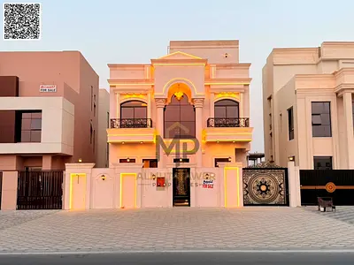 Classic villa for sale in the heart of Al Helio 2, Ajman - registration and ownership fees included - close to all services - on the main road - at a