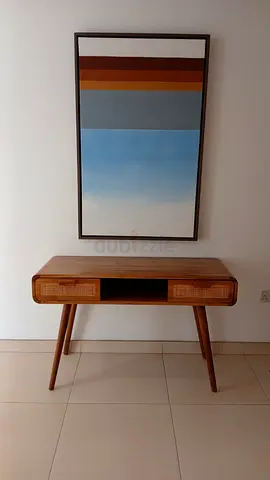 Mid-century style wooden console table with cane drawers