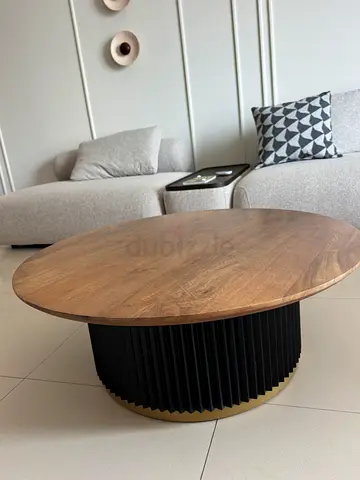 Round Coffee Table with Wooden Top and Black Ribbed Base