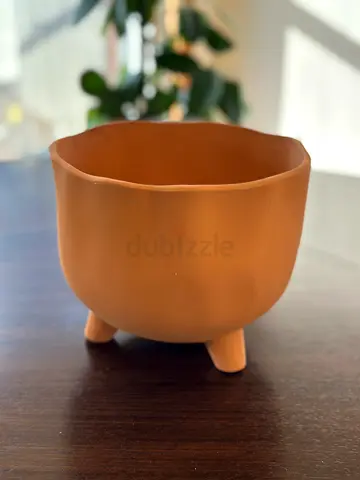 Small terracotta three-legged plant pot / decorative planter