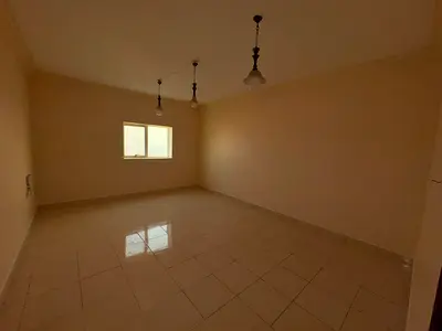 Master bedroom and living room in Al Nuaimiya, 2 central air conditioning units, 2 bathrooms, and maintenance is the owner's responsibility. 30,000