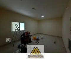 Large studio in Al Nakheel, 2nd row from Ajman Corniche, central AC, semi-kitchen, AED 18K, 6 paymen