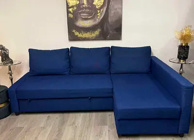 Blue L-shaped Sofa with Storage - Good Condition