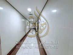 One-bedroom apartment with a living room in Al Majaz 3, featuring central A/C and gas, built-in ward