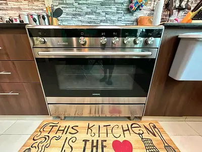 Siemens stainless steel freestanding cooker with gas hob and electric oven - good condition