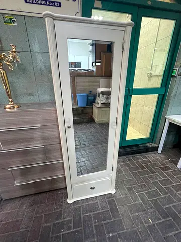 White freestanding mirrored wardrobe with drawer - compact storage