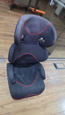 Used children's booster car seat (high-back) - black with red trim