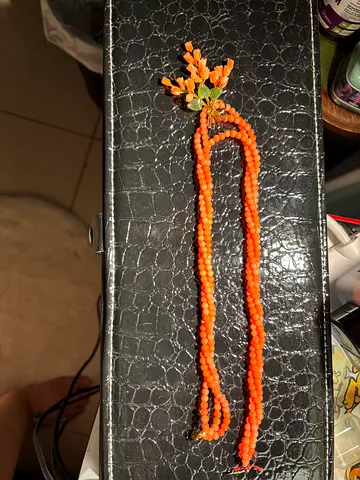 Coral Handmade very unique orange coloured beaded necklace with floral pendant golden plated