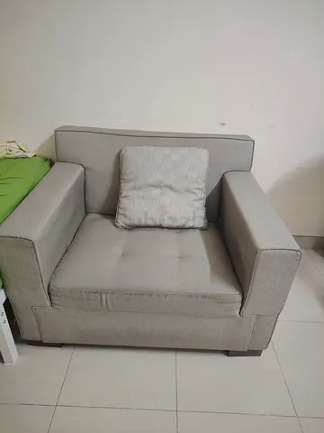 Single-seater and three seater grey fabric armchair with cushion - good condition