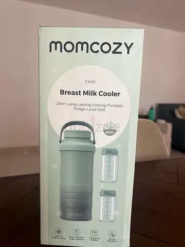 Brand New Momcozy 22oz Portable Breast Milk Cooler - Unopened Box
(حافظة وتبريد حليب الأم موم كوزي 2