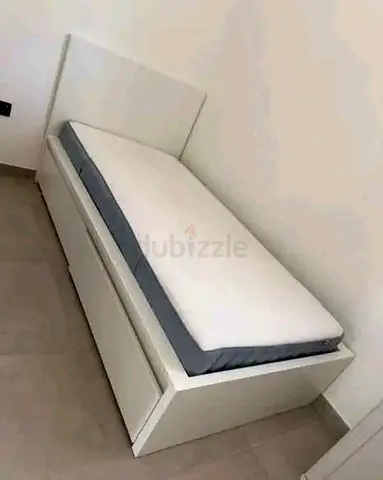 IKEA Brand single size bed with mattress and 2 storage drawers neat and clean available