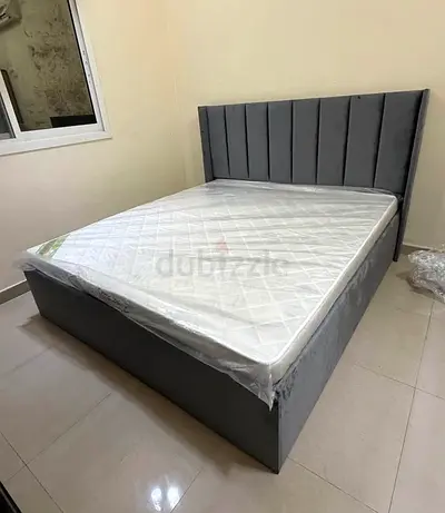 Grey upholstered bed frame with mattress - Queen size
