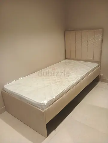 Single beige bed frame with mattress - like new