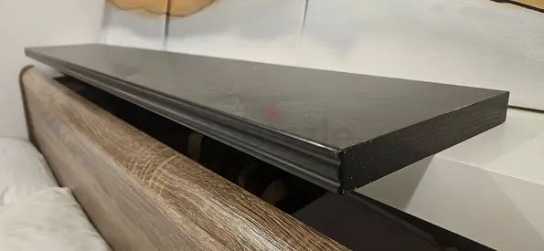 Long black wooden top shelf with wall bracket. (120cm)