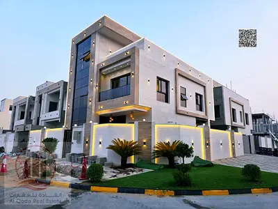 Villa for sale in Ajman, Al Zahia, including registration fees. 6 bedrooms with a master roof terrace, majlis, living room, and maid's room. Freehold