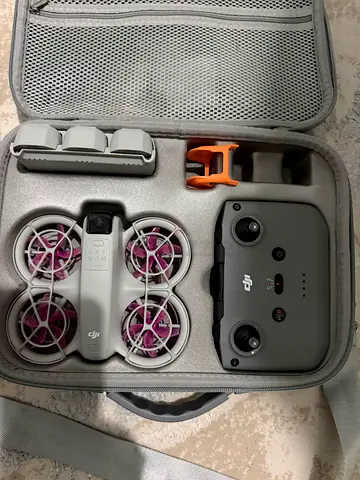 DJI neo with remote, extra batteries and carry case - good condition