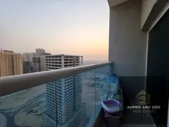 2BHK in Emirates City with 2 bathrooms, parking, 4–6 payments, AED 38,000 yearly, AED 5,000 deposi