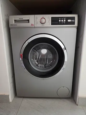 Silver front-loading washing machine - good working condition