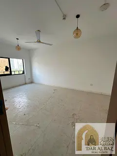 Apartment for annual rent in Abu Shagara area, 3 bedrooms and a living room, excellent size, 3 bathr