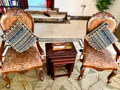 Pair of Classic Carved Wooden Armchairs with Nesting Side Tables