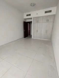 Two bedrooms and a living room for annual rent in Al Rashidiya 3 – next to Grand Mall, with free p