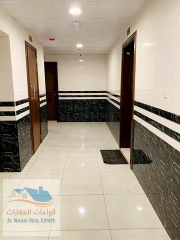 A spacious studio apartment is available for annual rent in Al Jurf 3, Ajman, in a prime location offering easy access to Dubai and Sharjah exits.