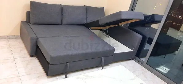 Grey L-shaped Storage Sofa Bed — Good Condition