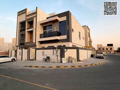 Modern villa on a corner lot with two street frontages | Ready with water, electricity, and air conditioning | Al Zahia, behind Al Qabail Mall