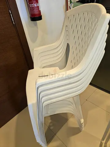 Stack of 5 White Plastic Outdoor Chairs - Good Condition
