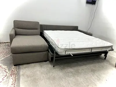 Like new condition marina home lshape sofabed with storage