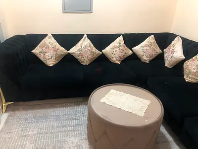 L-shaped velvet sectional sofa with ottoman -