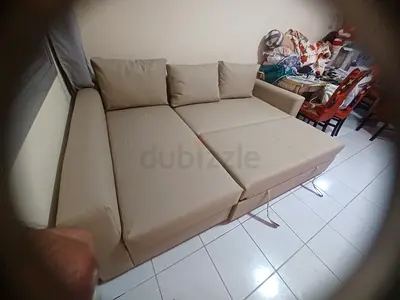 Beige L-shaped Convertible Sofa Bed — Good Condition