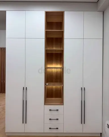 Built-in White Wardrobe with Open Oak Shelves and Drawers