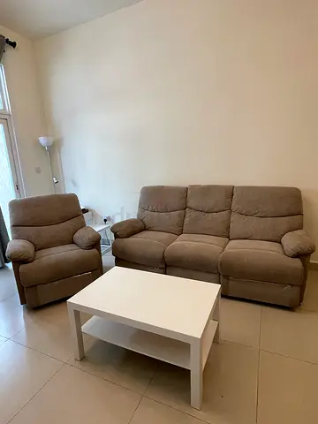 3 Seater beige fabric reclining sofa & Single seater beige fabric reclining sofa with white  table
