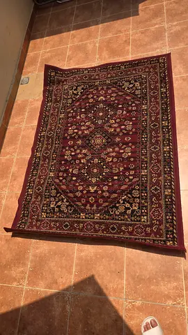Classic maroon Persian-style area rug - good condition